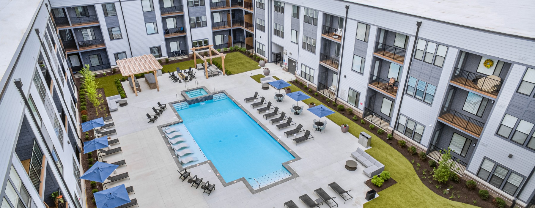 Aerial view of pool and putting green