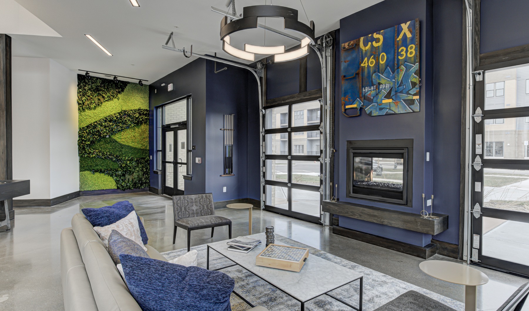 Lounge in our resident clubhouse interior photo of community space with couch